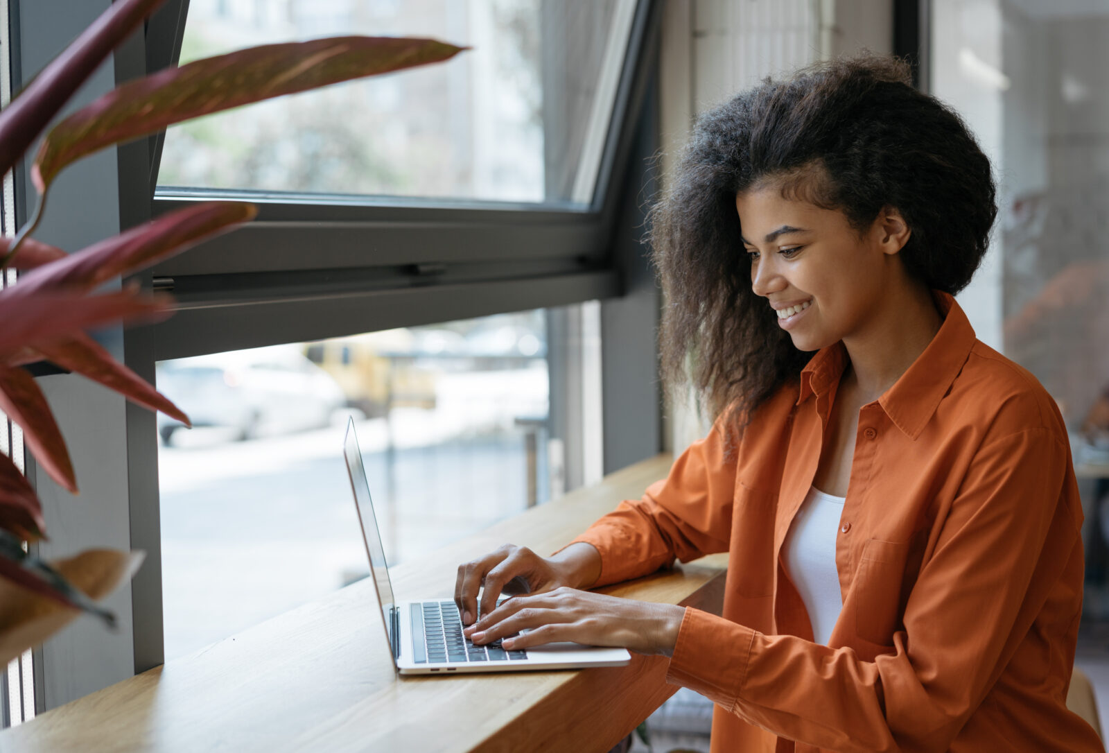 Woman searching on her laptop